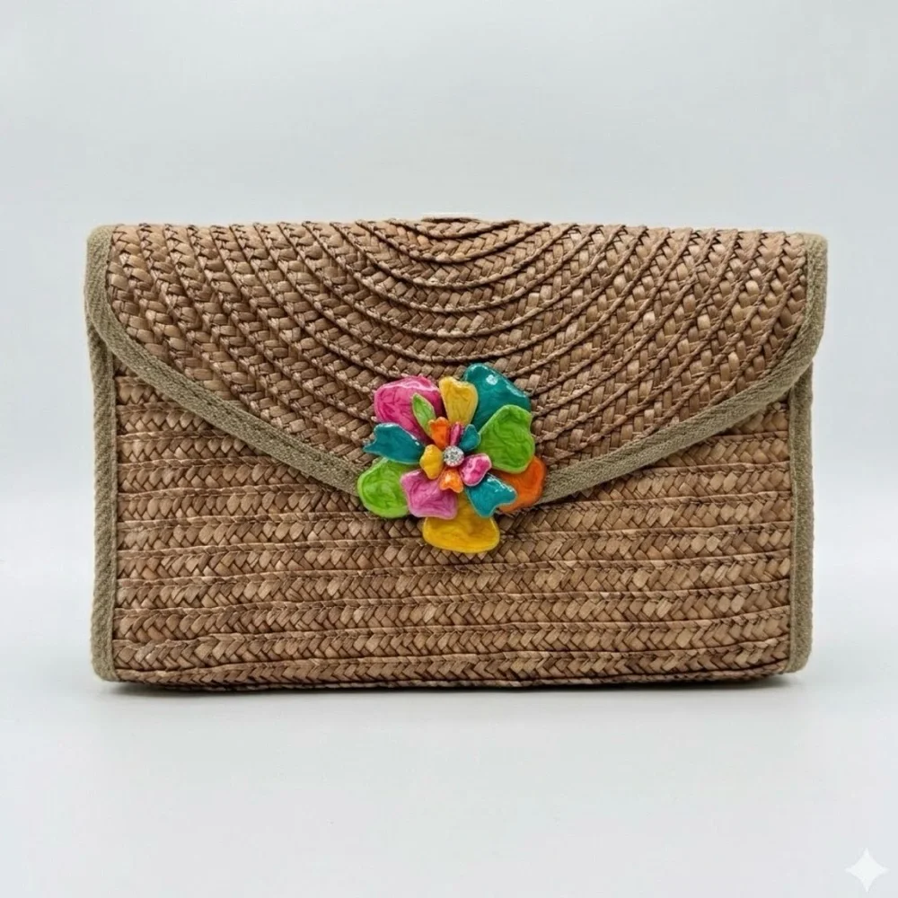 Boho-Chic Woven Straw Clutch with Vibrant Enamel Flower